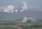 North Korea says held 'joint firepower attack drill' of long-range artillery, missile units