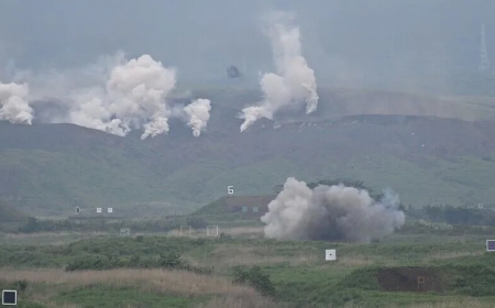 North Korea says held 'joint firepower attack drill' of long-range artillery, missile units